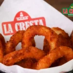 La Cresta onion rings served in branded basket.