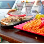 Food photo session capturing La Cresta fajita with rice and peppers.